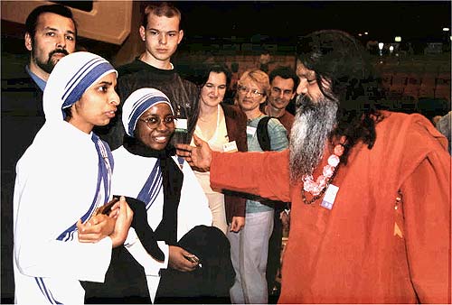 Swamiji is greeting guests