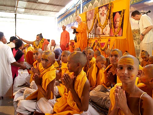 Swamiji sitting with the Hostel students after the Brahmacharya Ceremony