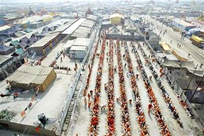 Bandhara (banquet) - a community feast on the banks of the Ganges River, during the Ardh Kumbh Mela in Allahabad, India, Saturday, Jan. 13, 2007 ((c) Associated Press)