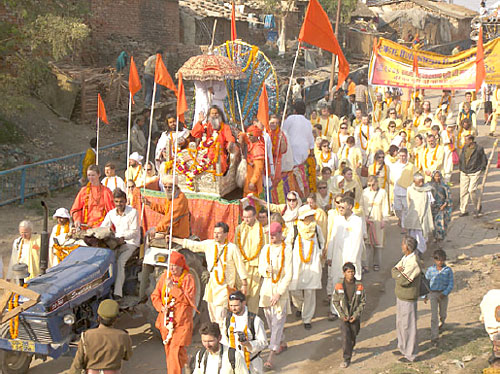 Procession of Yoga in Daily Life group with His Holiness Swamiji in front giving blessings